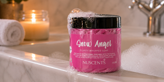 Snow Angel Whipped Soap on bath with bubbles and candle in background