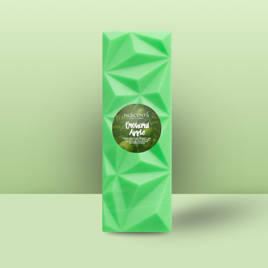Green wax melt snap bar with geometric design for home fragrance